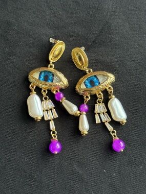Schiaparelli Inspired Gold Eye Drop Earrings with Blue Iris and Purple Accents